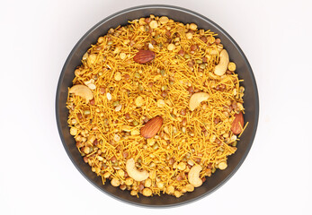 mixture or chiwda a fried snack with variety of fried nuts and other freid snack like sev and boondi mixed together
