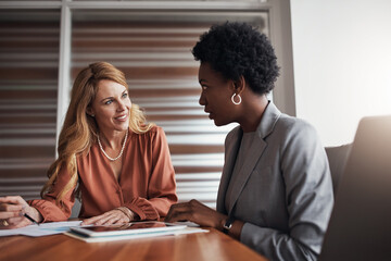 Business, tablet and women with documents in office meeting for planning, research or financial report or review. Economy, problem solving or accountant consulting mentor with inflation solution idea