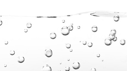 水面と気泡、炭酸水や清潔感や洗濯をイメージする水中の泡