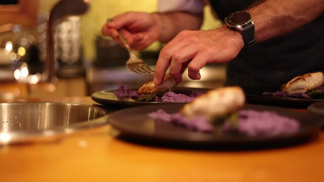 Gourmet Chef Plating Fish; Slow Cinematic Culinary Table.