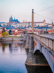 View of the city of Prague castle in hradcany and the Vltava river from bridge  in Prague, Czech Republic.