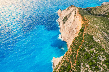 Zakynthos, Greece. Navagio Beach with sjipwreck in Ionian Sea. Beautiful views of azure sea water and nature with cliffs cave. Boat trip