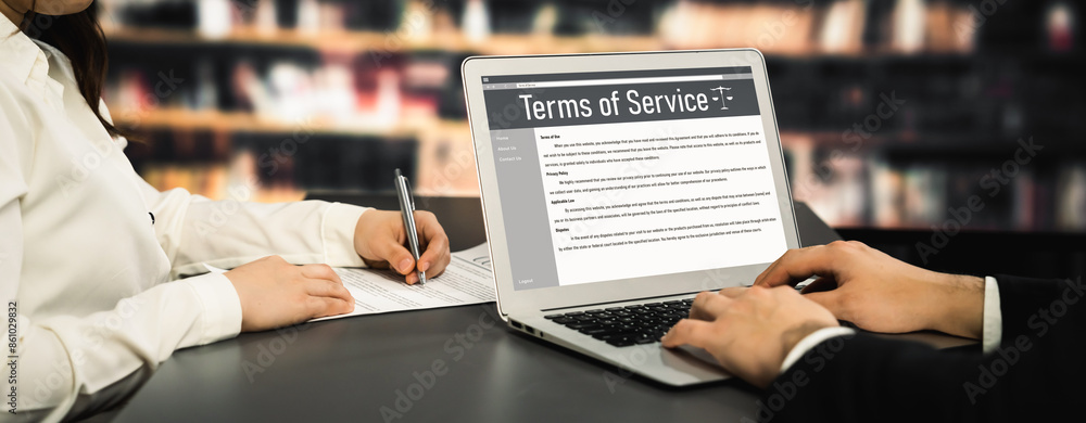 Poster online term of service conditions showing savvy rules and regulations in using the website on a lapt