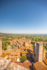 Medieval San Gimignano hill town with skyline of medieval towers, including the stone Torre Grossa. Province of Siena, Tuscany, Italy.