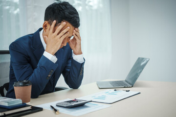 Naklejka premium A banker in a suit works at a desk, handling loans, analyzing client financial data, providing financial advice, dealing with stocks, and researching economic situations. Economic stress from