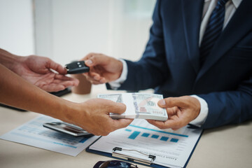 A man in a suit sells cars at his desk, offers online car insurance , car loans, comprehensive coverage, cash withdrawals via credit cards, and provides free legal consultations on automotive issues