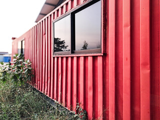 Red Shipping Cargo Container for Logistics and Transportation with glass