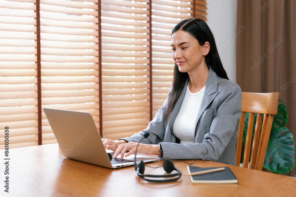 Aufkleber female call center operator or customer service helpdesk staff working on workspace while talking on