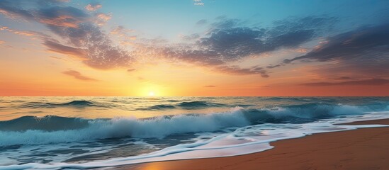 Fototapeta premium Tranquil tropical paradise beach at sunset with calm sea and palm trees along the coast, perfect for a serene summer vacation with a captivating seascape view and copy space image.