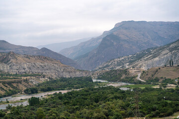 Caucasian mountain. Dagestan. Trees, rocks, mountains, view of the green mountains. Beautiful summer landscape.