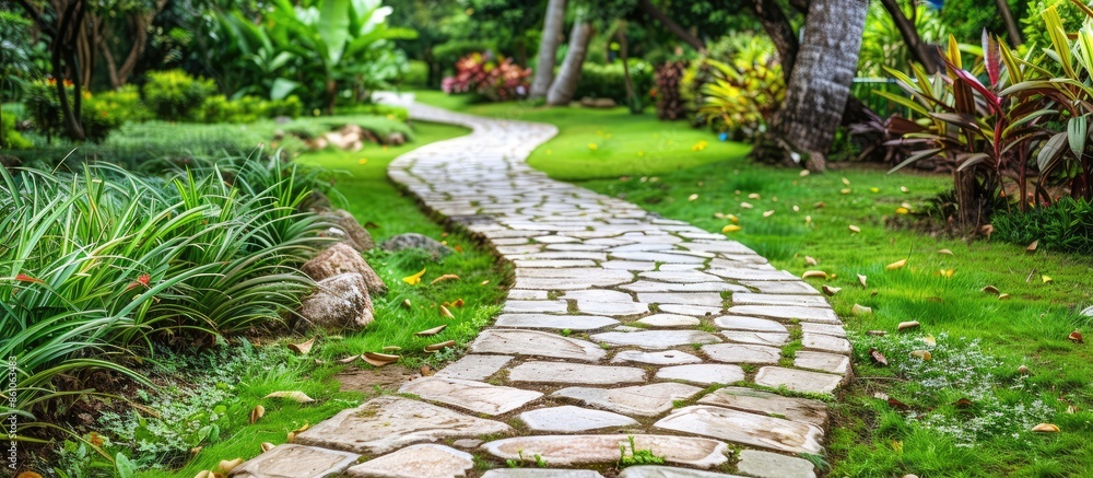 Poster Landscaping in the garden. The path in the garden. with copy space image. Place for adding text or design