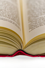 Close-up of open book against white background. Photo taken June 22nd, 2024, Zurich, Switzerland.
