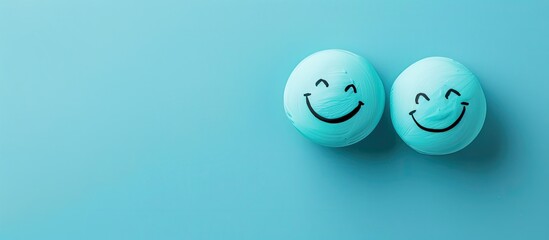 Couple Bubble smile with happy face on pastel blue background, Positive thinking, Mental health assessment, World mental health day concept. with copy space image. Place for adding text or design