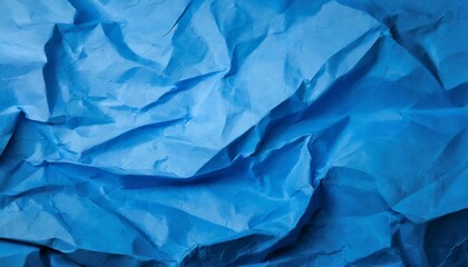 Obraz premium crumpled blue paper texture background