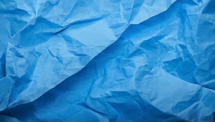 Obraz premium crumpled blue paper texture background