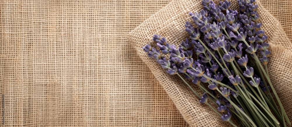 Poster a bunch of lavender in burlap pastel background flower. copy space image. place for adding text and 