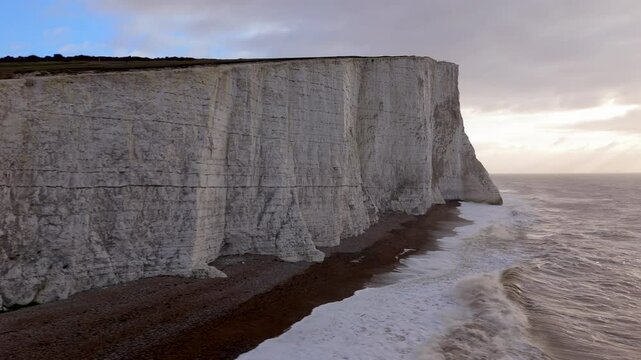 Experience the beauty of the Seven Sisters cliffs in the UK, composed of brilliant white chalk rocks with breathtaking views of the English Channel. Enjoy the dramatic coastal landscape