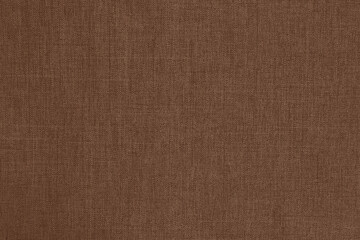 Dark brown linen fabric cloth texture for background, natural textile pattern.