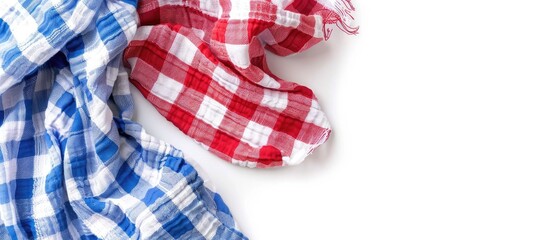 Obraz premium Red and blue checkered tablecloth top view isolated on white, food decor design element.Folded kitchen towel. Picnic cloth.Napkin. Copy space image. Place for adding text or design