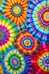 Obraz premium Vibrant Rainbow Spiral Tie-Dye Design for Backgrounds and Textures