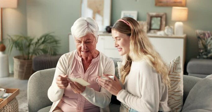 Grandma, woman or photograph for memory in home for nostalgia, learning or to remember. Senior grandmother, girl or family with pictures of old people, history or retro album on sofa in house lounge
