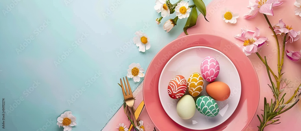 Poster festive easter table setting with painted eggs on color background, top view. space for text. copy s