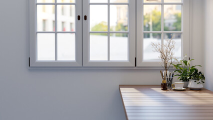 A side view image of a wooden table with decorative plants by the window in a minimalist white room.