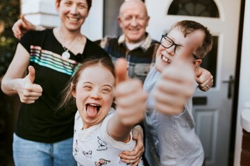 Happy family, kids with down syndrome