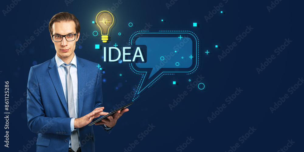 Poster attractive young european businessman using tablet with creative speech bubble and light bulb on dar