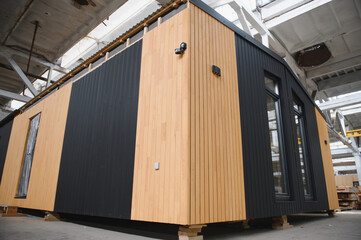 Production of new wooden modular houses. Construction site