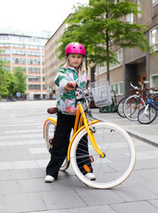 young nine year old girl on the bicycle
