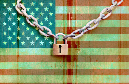 Chain over American flag symbolizing immigration restrictions