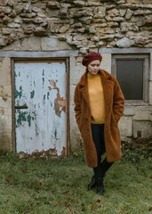Woman in brown autumn outfit