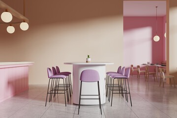 Modern cafe interior with pink chairs and round table, minimalist design, bright lighting, concept of contemporary dining space.  3D Rendering