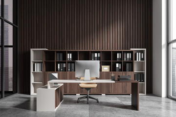 Modern office interior with wooden cabinets, large desk, and computer, minimalist style, city view through large windows, contemporary workspace concept.  3D Rendering