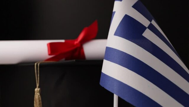 Greek  education and language learning, graduation cap with diploma and flag of Greece, global academic achievement and ceremony