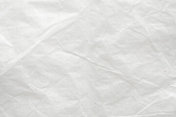 Abstract white crumpled and creased recycle paper texture background