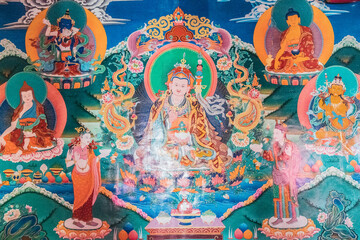 A detailed view of a vibrant tibetan deity painting displayed on a wall, Stakrimo Monastery in Zanskar