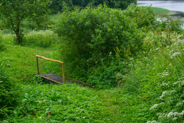 A wooden bridge over the river