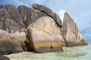 Shoreline of a tropical island in the Seychelles and view of the Ocean