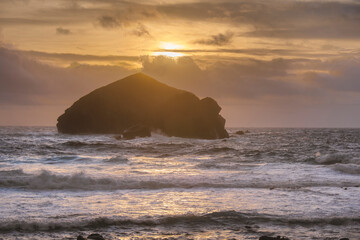 Portoguese Island Silhouette During Sunset With Waves