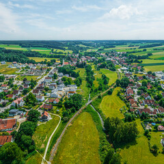 Fototapeta premium Die Gemeinde Langenneufnach im Naturpark Augsburg - Westliche Wälder im Luftbild