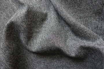 Black and white viscose and polyester fabric in soft folds