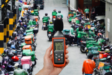 Measure the noise level on city roads motorcycle traffic.Noise pollution prevention concept