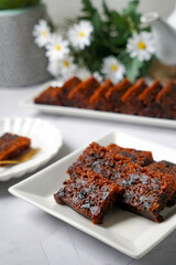 Fruit cake.  In Malaysia, fruit cake is known as Kek Buah. Selective focus.