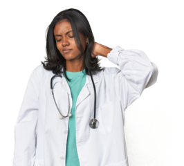Young Indian doctor with stethoscope suffering neck pain due to sedentary lifestyle.