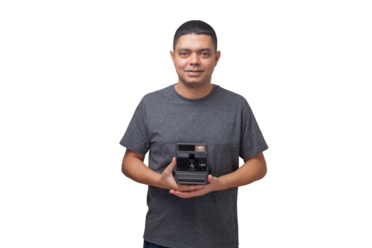 Portrait of photographer with vintage camera on neutral background. Photographer concept. Portrait concept. Copy space.