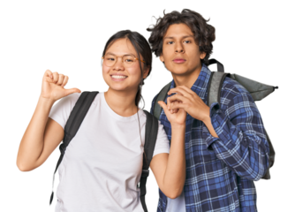 Young interracial student couple studying feels proud and self confident, example to follow.