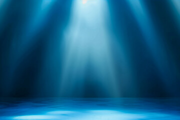 Obraz premium Blue background with empty stage lit by spotlights for product presentation