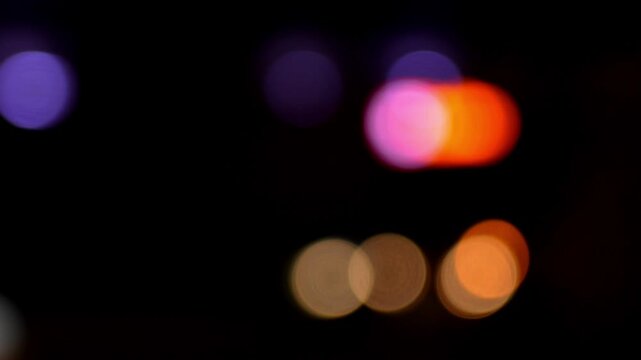 Paris, France - June 21, 2024: Headlights of cars and trams in Paris